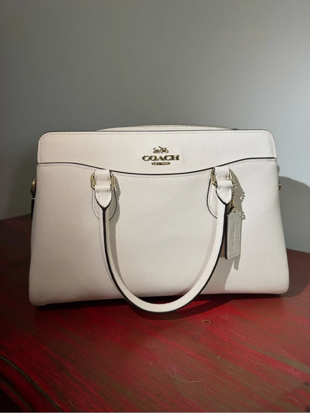 Coach Darcie carryall, with gold accents